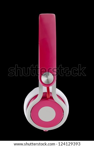 Pink headphones isolated on a black background