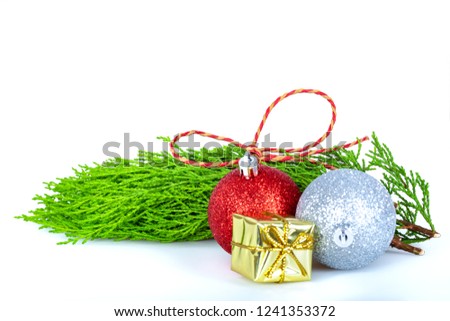 Christmas decoration baubles with branches of fir tree on white background
