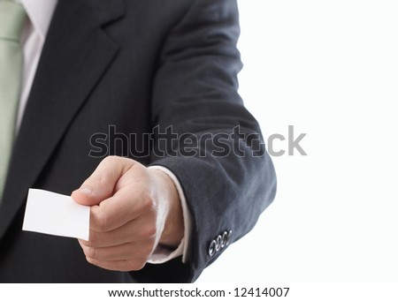 Anonymous businessman offering business card