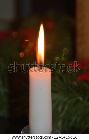 Christmas background with first Advent candle.