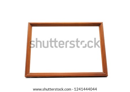 Vintage wooden photo frame on an isolated white background
