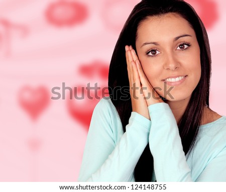 Pretty brunette woman sleeping with a pink background
