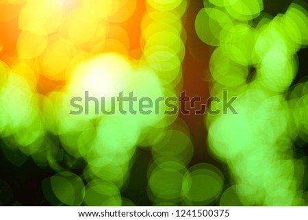 Abstract green bokeh on black background and warm lights at night picture