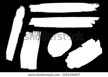 Collection of hand drawn white grunge brushes. Vector Grunge Brushes. Dirty Artistic Design Elements. Creative Design Elements. Black background. Distress Frame, Logo, Banner, Wallpaper.