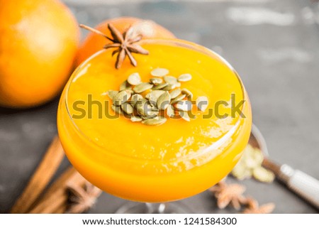 Refreshment and healthy autumn pumpkin drink. Selective focus. Shallow depth of field. 