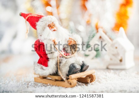 Beautiful decorated New Year Tree and Santa Claus  on white background. Postcard concept.