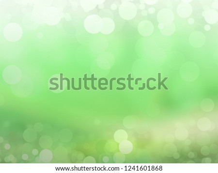 Bright glowing green nature background in the form of bokeh