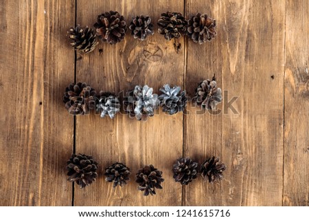 lines circle wooden background spruce cones wooden background new year concept, top view place for text