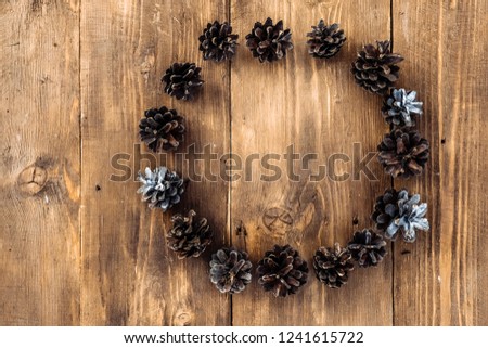 lines circle wooden background spruce cones wooden background new year concept, top view place for text