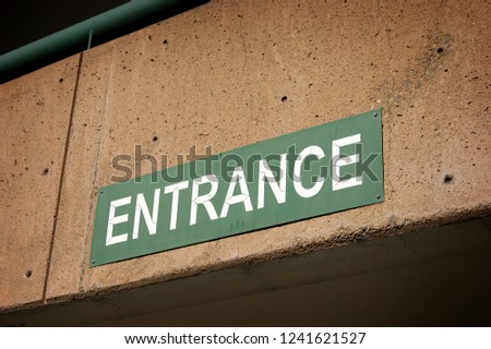 entrance sign on parking structure