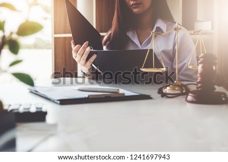 The law should know the concept, business entrepreneur woman, read the rules of business that her does business. Royalty-Free Stock Photo #1241697943