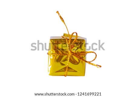 Isolated Gift box gold for the festivities on a white background with clipping path.