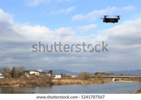 Drone flying over the river