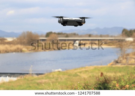 Drone flying over the river