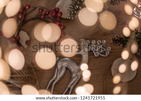 Christmas preparations - toys,lanterns, gold cones. Bokeh background