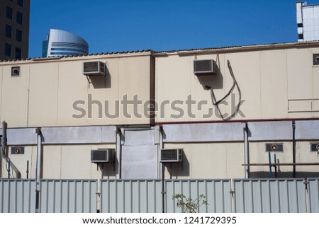 air conditioning equipments on exterior building