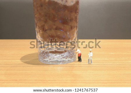 the mini of small bartender figure with drink