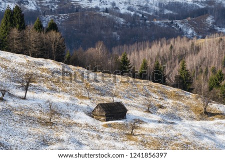 Mountain hut in beautiful winter scenery