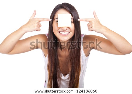young beautiful woman with post-it stuck on forehead