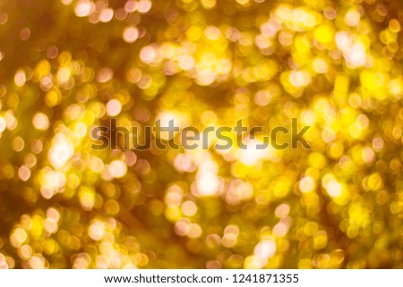 Abstract glamorous white silver and gold bokeh lights glitter sparkle. Defocused background have luxury golden color party invite for birthday, anniversary, holliday, new year’s eve or Christmas.