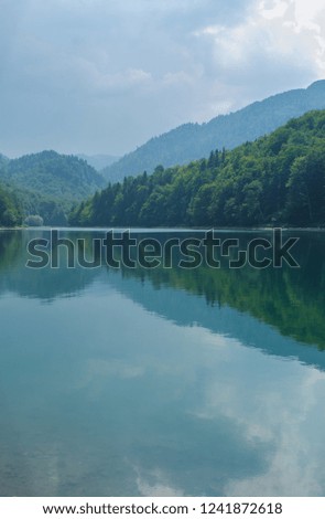 Beautiful landscapes in the summer season, mountain lake and sunlight