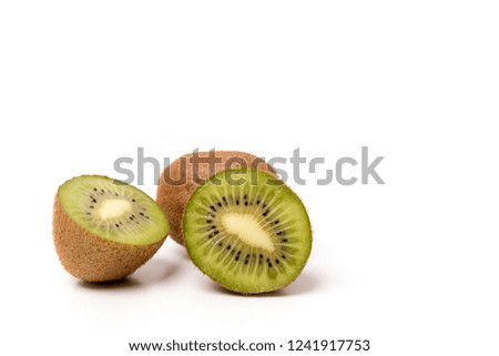 Kiwifruit slices, fresh kiwifruit on a white background