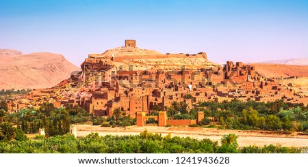 Amazing view of Kasbah Ait Ben Haddou near Ouarzazate in the Atlas Mountains of Morocco. UNESCO World Heritage Site since 1987. Artistic picture. Beauty world. Royalty-Free Stock Photo #1241943628