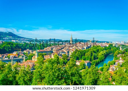 Aerial view of Bern dominated by Münster cathedral and Bundeshaus, Switzerland

