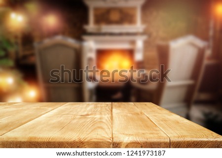 Old destroyed table in the Christmas evening  