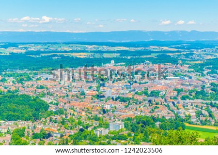 View from Gurten hill on Bern dominated by Münster cathedral and Bundeshaus, Switzerland
