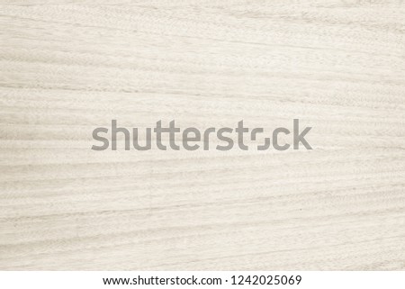 Old plywood textured wooden background or wood surface of the bright brown at grunge dark grain wall texture of panel top view. Vintage teak surface board at desk  texture with light pattern natural.