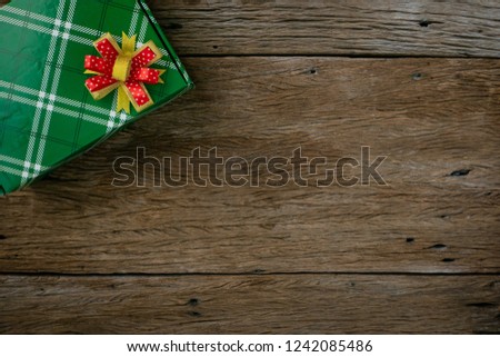 flat lay.Gift box on Wooden rustic Wall Surface or Old Vintage Planked Wood background.copy space for your text or image. top view