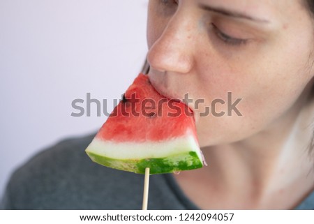 portrait of a girl with a slice of watermelon