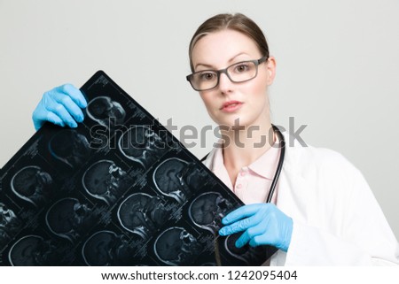 female doctor with a x-ray picture