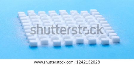 White sweet sugar cubes seamless pattern - Blue background