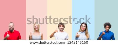 Collage of group of young people over colorful vintage isolated background doing happy thumbs up gesture with hand. Approving expression looking at the camera with showing success.