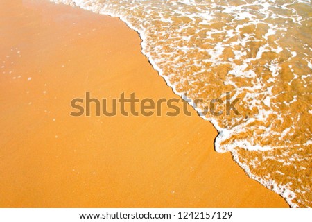 Golden sand and sea surf