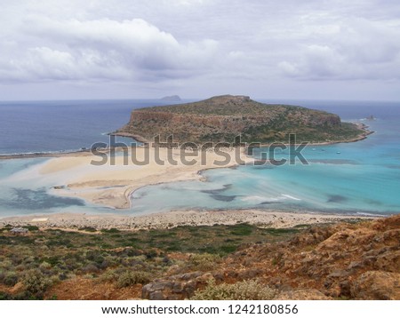Amazing Balos blue Lagoon with Cape Tigani in the center in Crete island, Greece. Viewpoint from the Balo's beach trail at the western part of Kissamos Bay.  Royalty-Free Stock Photo #1242180856