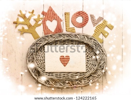 Vintage holidays card with a  house and heart as a symbol of love/valentines day card with word "love"