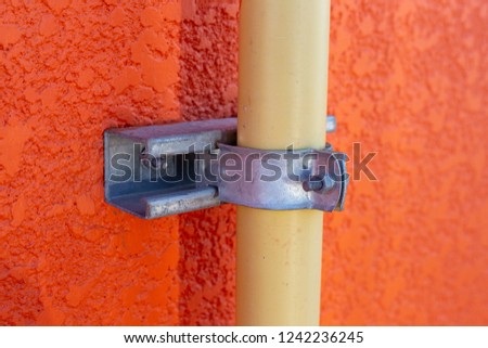 Conduit clamp to fix the EMT or IMC pipe to the wall.