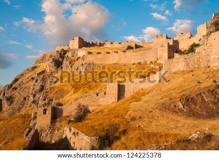 Old fortress, Acrocorinth,  of ancient Corinth at sunset, Greece Royalty-Free Stock Photo #124225378