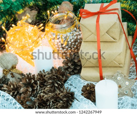 Christmas gifts and garlands under the tree