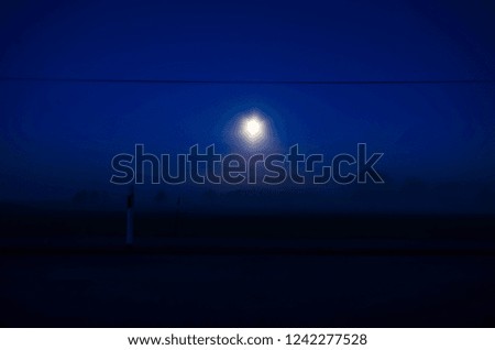 Mystery night with foggy moon