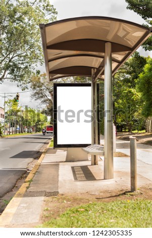 Empty advertisement banner on bus station in city in Costa Rica