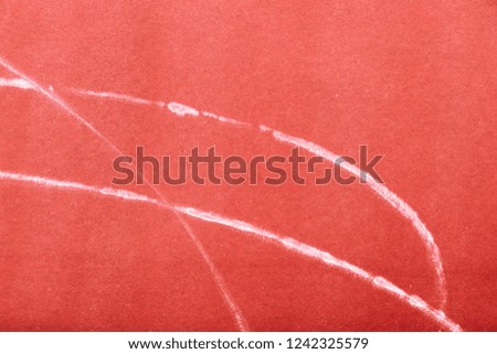 Texture of red paper background with abstract white curved stripes. Empty template and mockup. Vintage and obsolete background