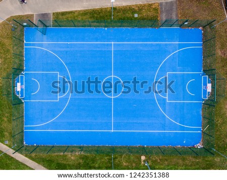 Aerial view of basketball court without players in public park in St Mellons Cardiff UK. Top view of basketball court