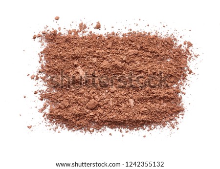 Texture of broken brown eye shadow isolated on white background. Macro texture of broken brown powder