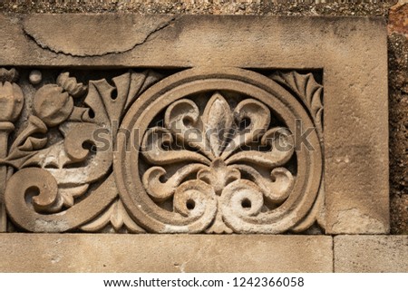 Elements of architectural decorations of buildings on the streets in Catalonia, public places.