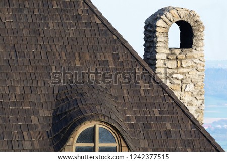 Shingle roof with a window and a chimney. Stary Jicin Castle. Moravia. Czech Republic. Europe