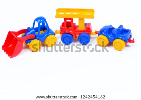Toy plastic cars on white background